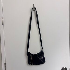 Marc Jacob cross body’s black zipper bag